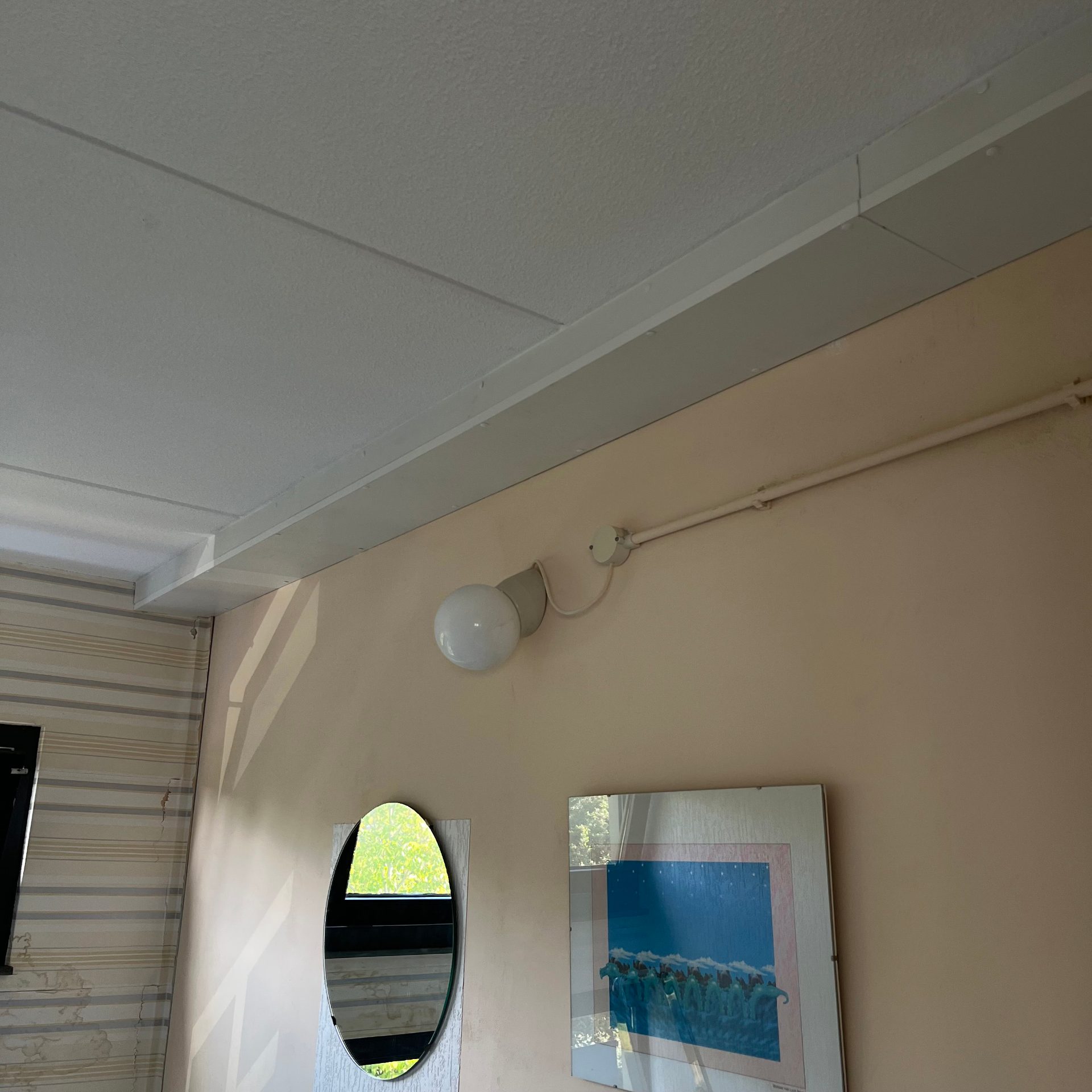 Houten bekleding steunbalk gerepareerd